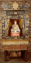Shrine, carved ivory, black & gold (table top size)